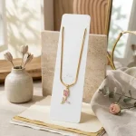 Stainless steel floral pendant necklace with delicate tulip bud design