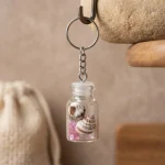 Mini Seashell Bottle Keychain with clear glass bottle and metal chain
